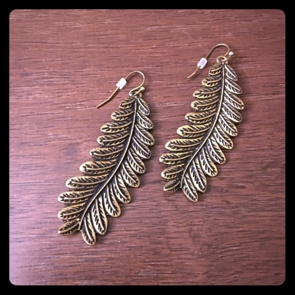 Gold tone leaf earrings